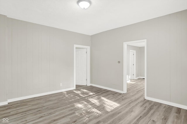 empty room featuring hardwood / wood-style flooring