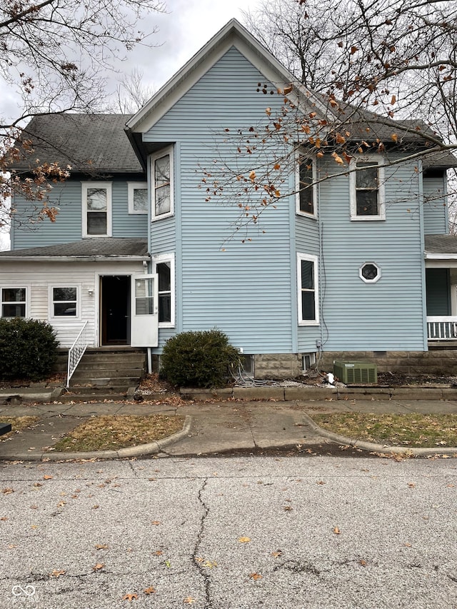 view of front of property with cooling unit