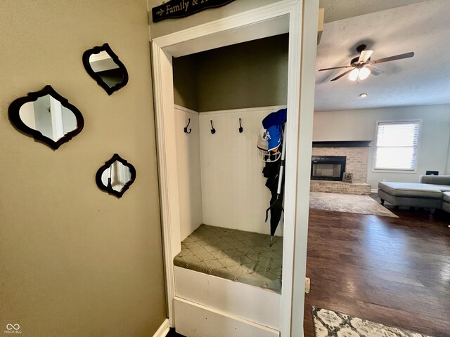 mudroom with ceiling fan and wood-type flooring