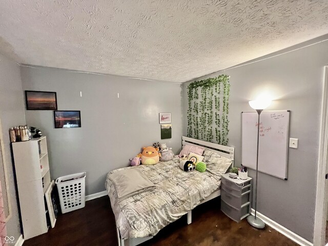 bedroom featuring a textured ceiling