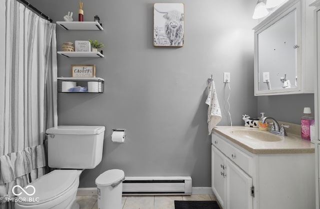 bathroom featuring tile patterned flooring, a baseboard radiator, toilet, and vanity