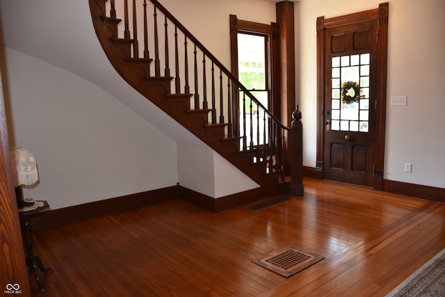 entrance foyer featuring hardwood / wood-style flooring