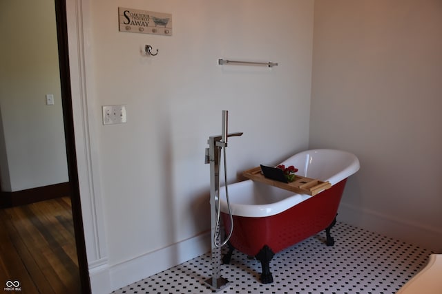 bathroom with a tub to relax in