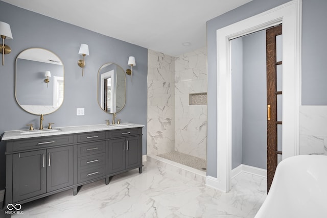 full bathroom featuring a marble finish shower, a soaking tub, marble finish floor, and a sink