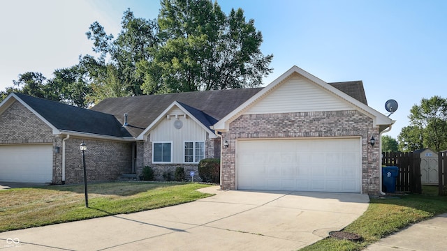 ranch-style home with a front lawn and a garage