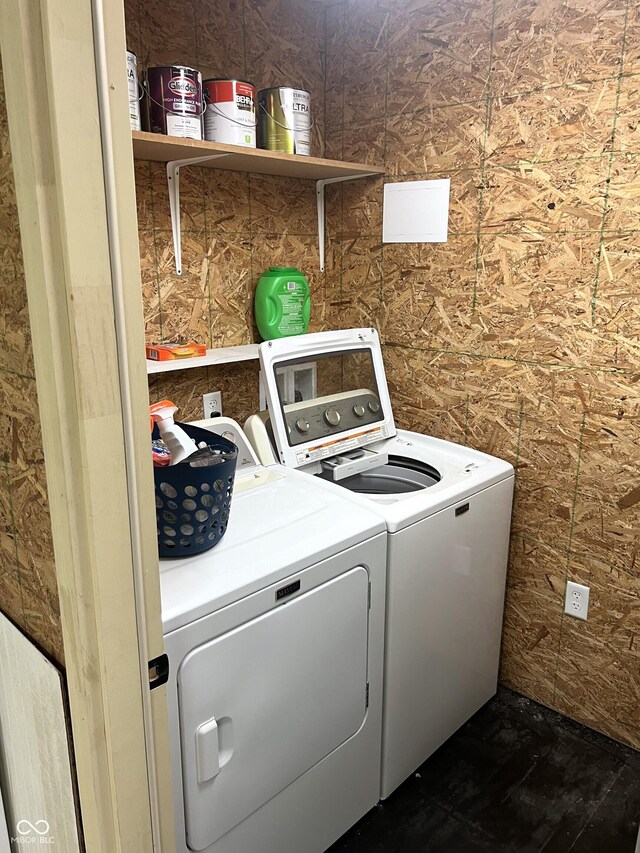 laundry area featuring washing machine and clothes dryer