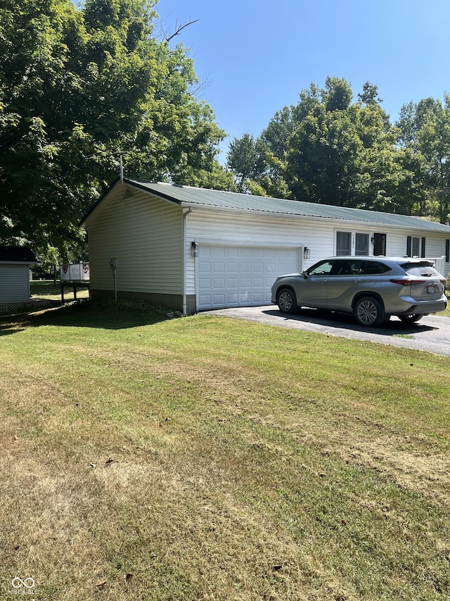 view of property exterior with a lawn