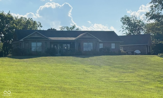 ranch-style house with a front yard