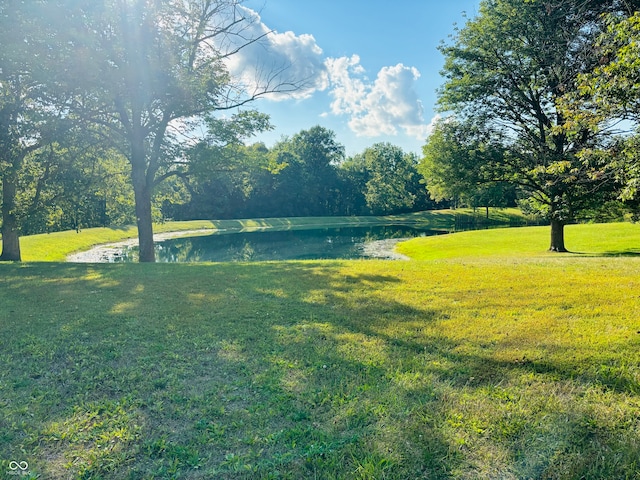 view of yard with a water view