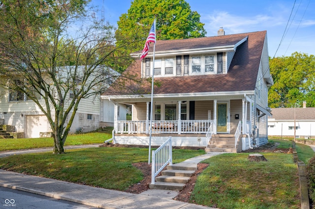 view of front of home featuring a porch and a front yard