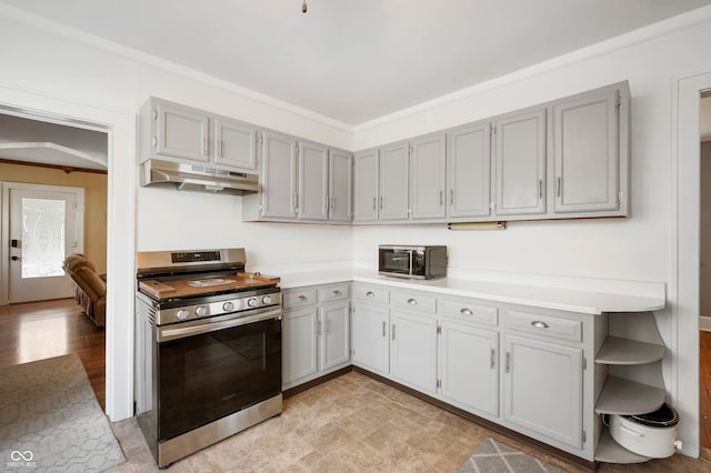 kitchen featuring appliances with stainless steel finishes, crown molding, and gray cabinets