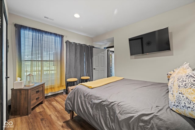 bedroom featuring light wood-type flooring