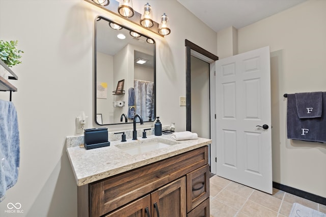 bathroom featuring tile patterned floors and vanity