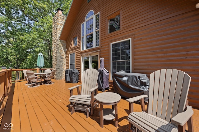 wooden deck with grilling area