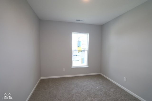 view of carpeted spare room