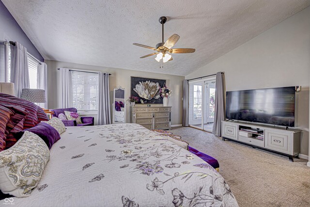 carpeted bedroom with lofted ceiling, ceiling fan, and a textured ceiling