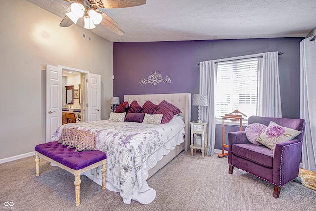 bedroom featuring a textured ceiling, lofted ceiling, ceiling fan, and carpet