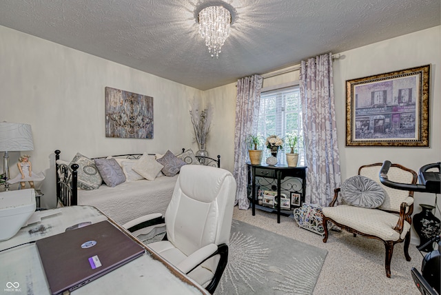 carpeted bedroom with a textured ceiling and an inviting chandelier