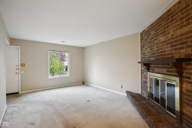 unfurnished living room featuring light colored carpet and a fireplace