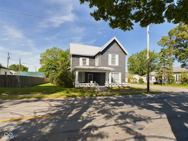 view of front facade with a porch and a front yard