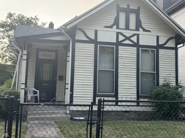 1804 N Delaware St, Indianapolis, IN 46202 - view of front of property featuring a chimney and a porch