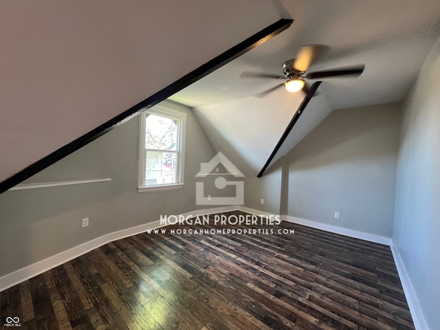 bonus room featuring vaulted ceiling, a textured ceiling, hardwood / wood-style flooring, and ceiling fan