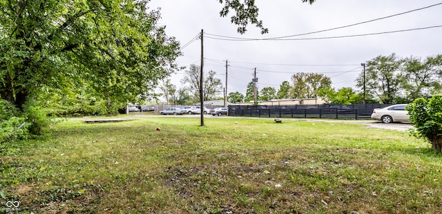 view of yard with fence