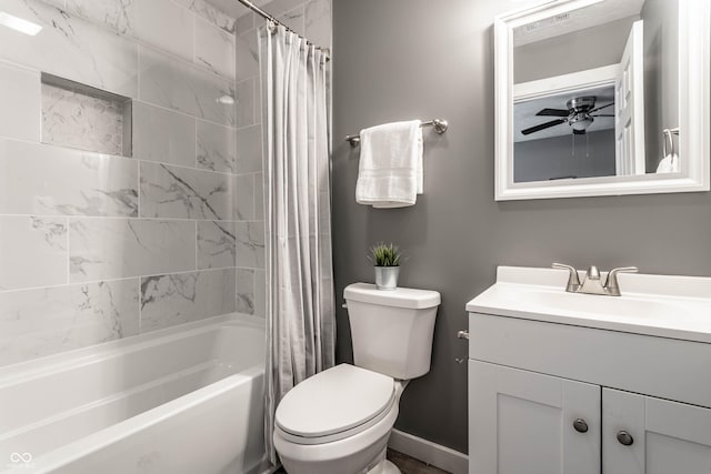 full bath with ceiling fan, shower / bath combination with curtain, vanity, and toilet