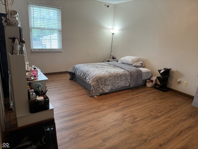 bedroom featuring hardwood / wood-style floors