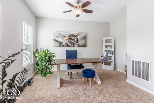 office area featuring ceiling fan and carpet floors