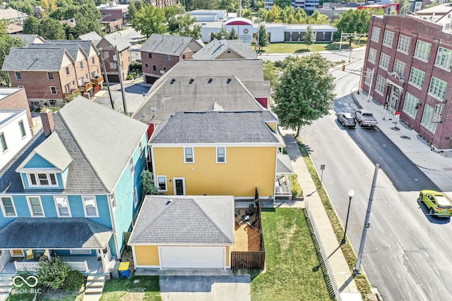 birds eye view of property with a residential view