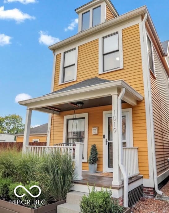 traditional style home featuring a porch