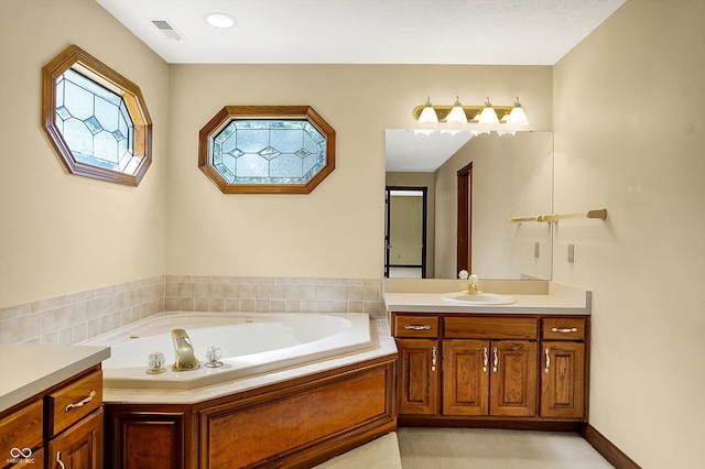 bathroom featuring a bathtub and vanity