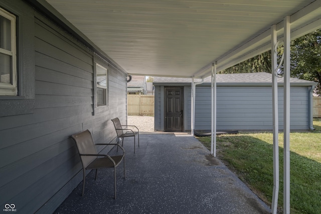 view of patio / terrace featuring fence