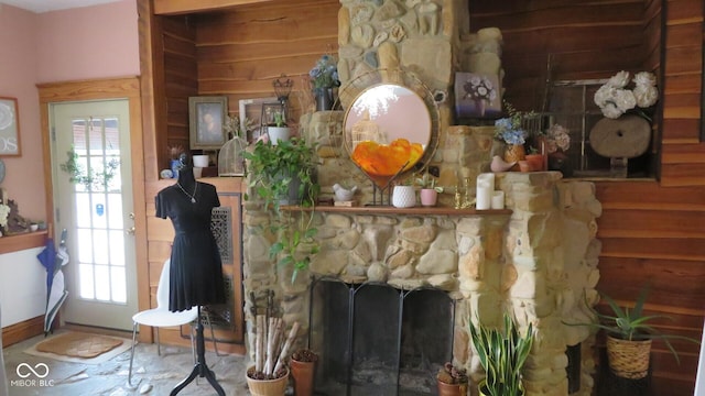 114 N Grant Ave, Crawfordsville, IN 47933 - room details with baseboards and a stone fireplace
