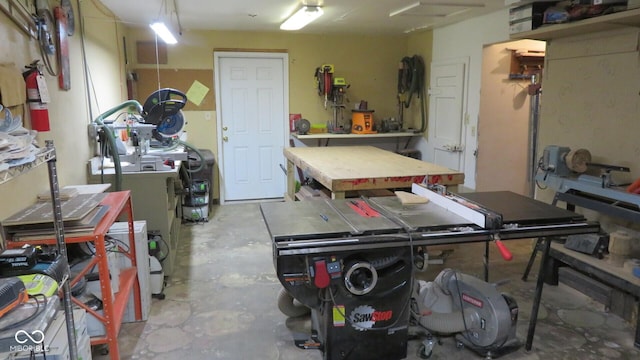 114 N Grant Ave, Crawfordsville, IN 47933 - garage featuring a workshop area and washer and dryer