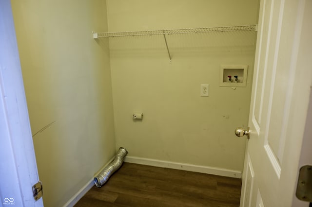 laundry area with hookup for a washing machine and dark wood-type flooring