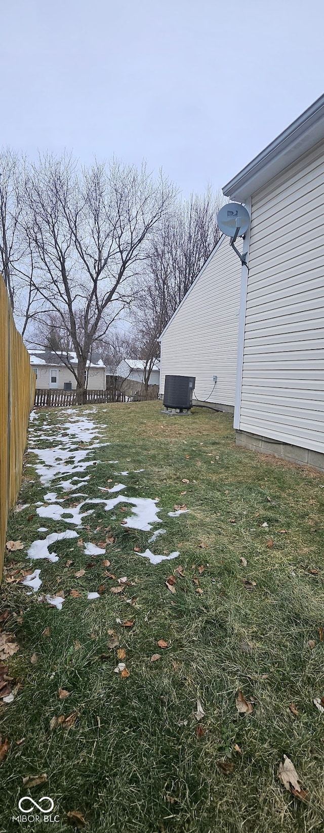 view of yard featuring central AC unit