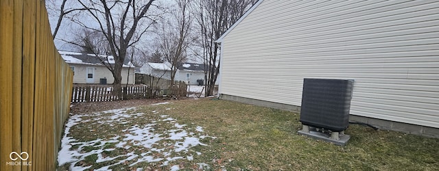 view of yard featuring central air condition unit