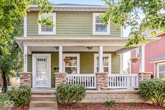 craftsman inspired home featuring a porch