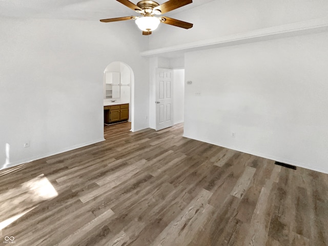 unfurnished room with ceiling fan and wood-type flooring