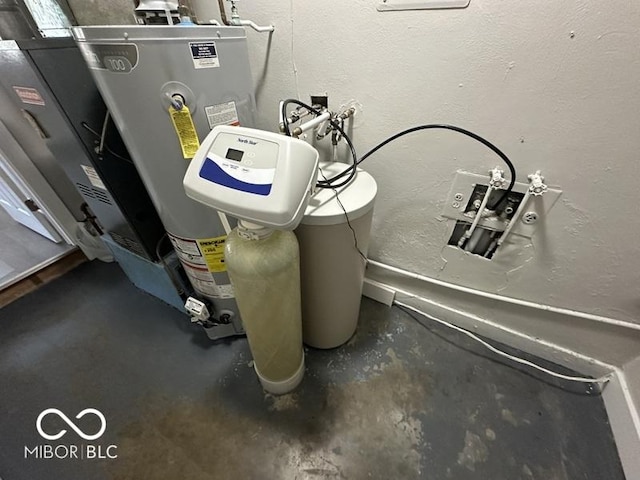 utility room featuring gas water heater