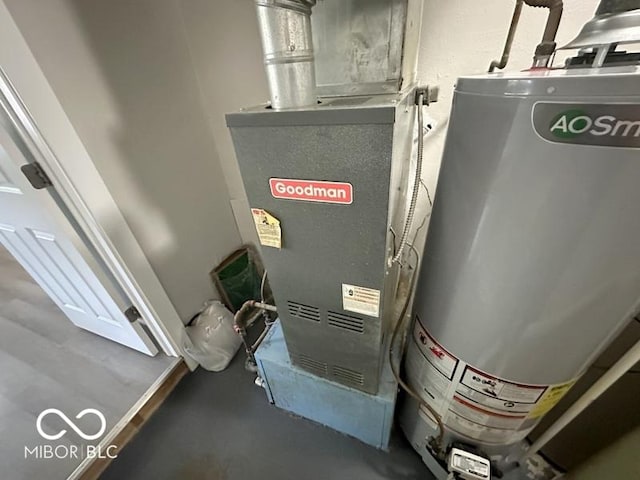 utility room with gas water heater