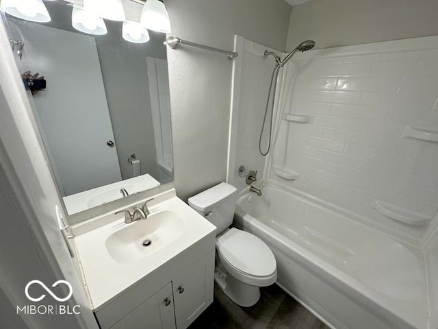 full bathroom featuring vanity, toilet, and tub / shower combination