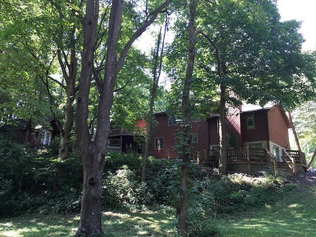 exterior space featuring a wooden deck