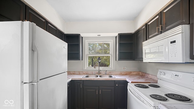 kitchen with white appliances and sink