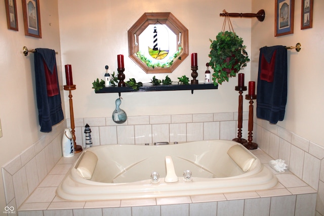 bathroom featuring a relaxing tiled tub