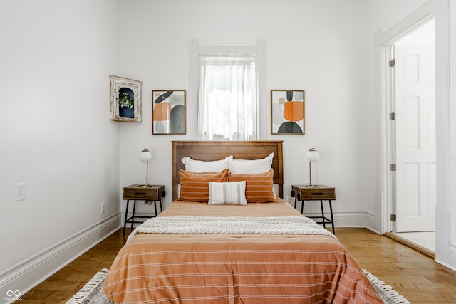 bedroom featuring wood-type flooring