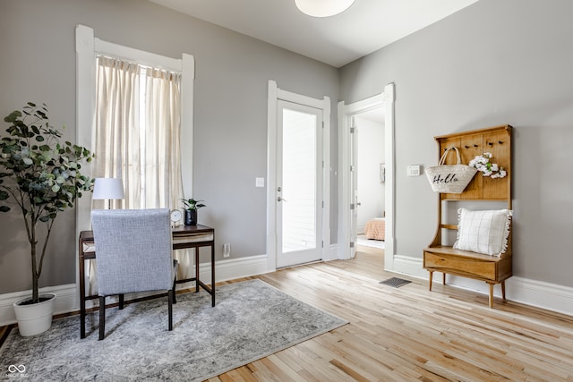 office space featuring light hardwood / wood-style floors