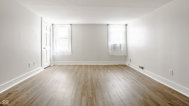 unfurnished room featuring light wood-type flooring